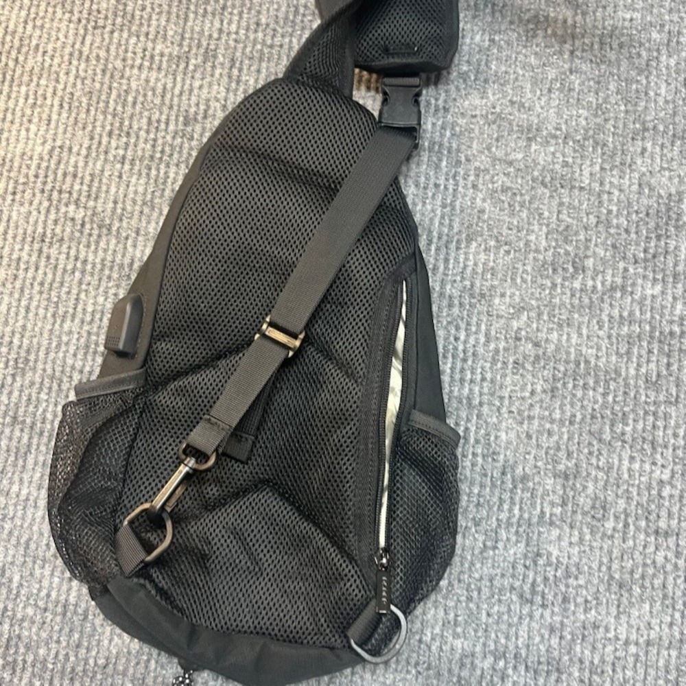 Black Sling Backpack Crossbody Shoulder Bag with Bungee Cord and Headphone Port - Picture 5 of 7